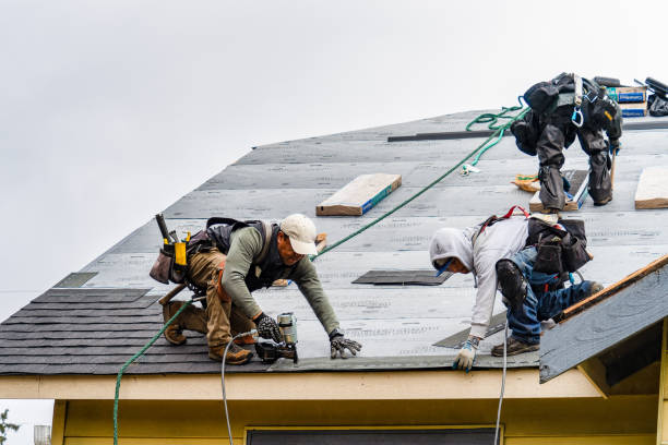Professional Gutter Installation technician working in Woxall, PA